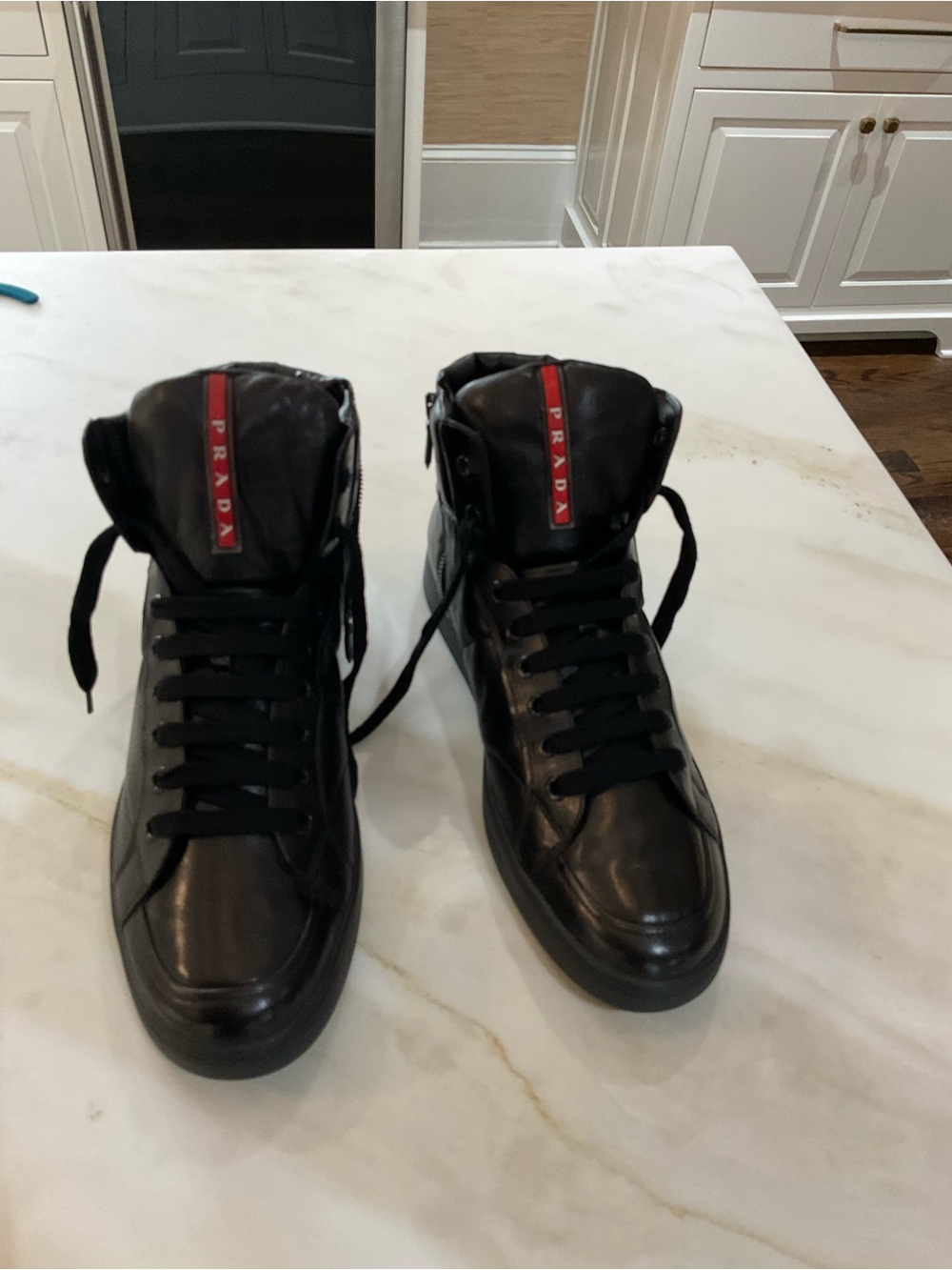 Prada Black High-Top Leather Sneakers with Red Logo Tape - Picture 8 of 8